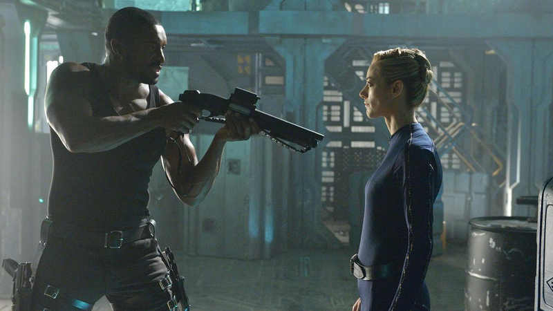 Roger Cross (left) and Zoie Palmer in Dark Matter (Image: Syfy)